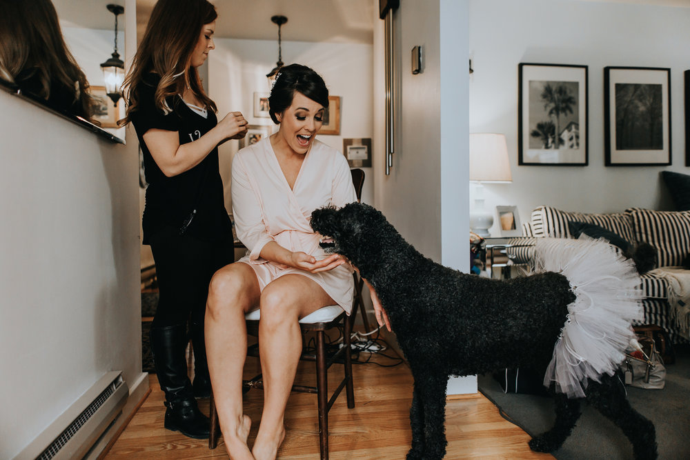 candid-getting-ready-wedding-day-photography-with-puppy