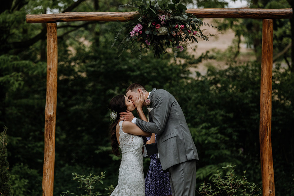 barn-swallow-farm-lehigh-valley-wedding-photography-ceremony-first-kiss