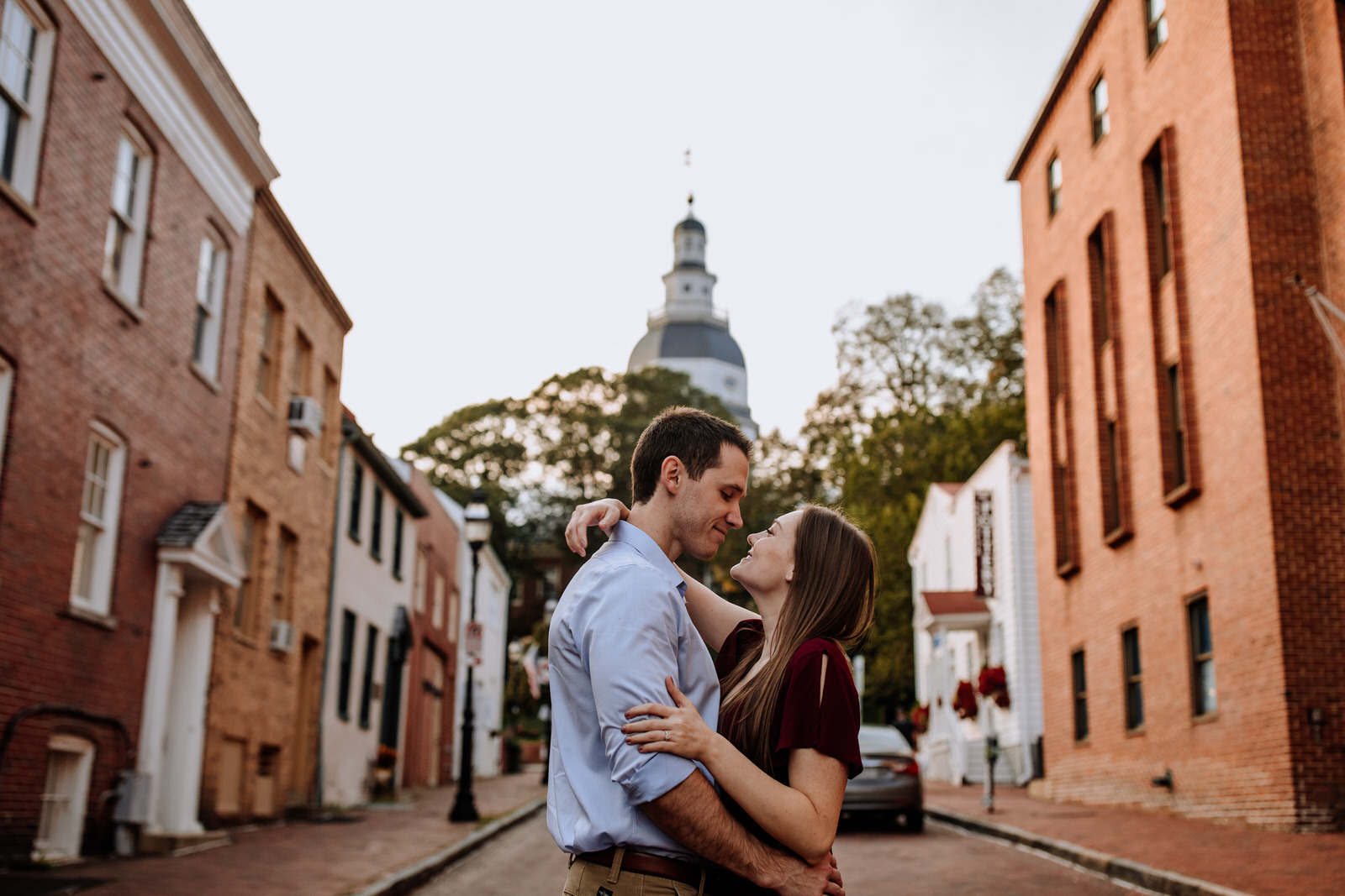 Man and woman standing in front of Annapolis, Maryland city hall