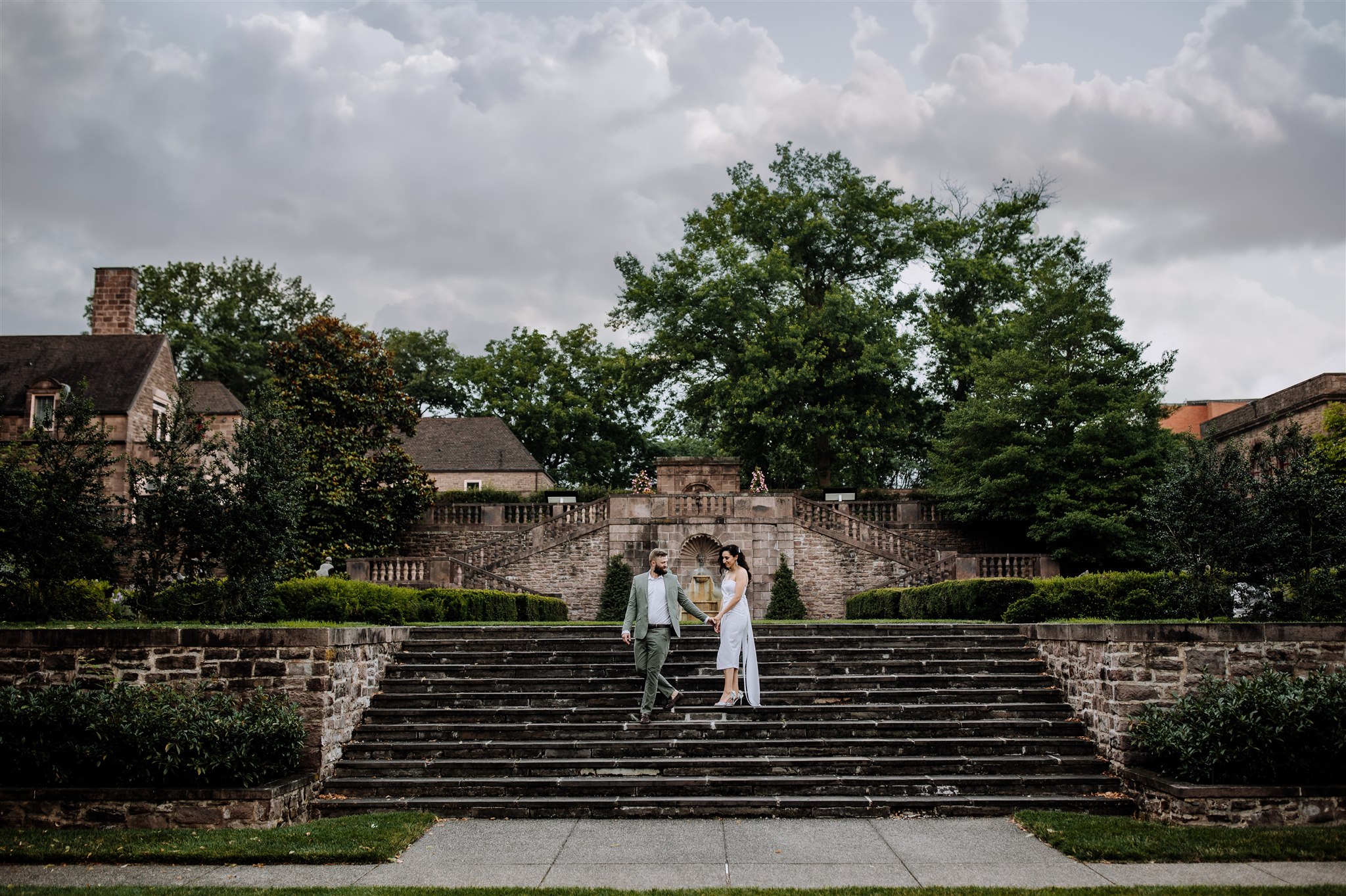 Couple walking down stairs at Tyler Gardens in Bucks County, PA